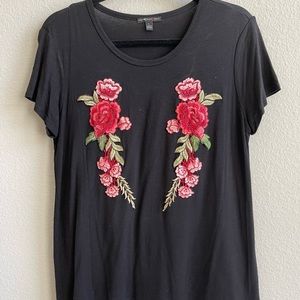 Women black top with rose